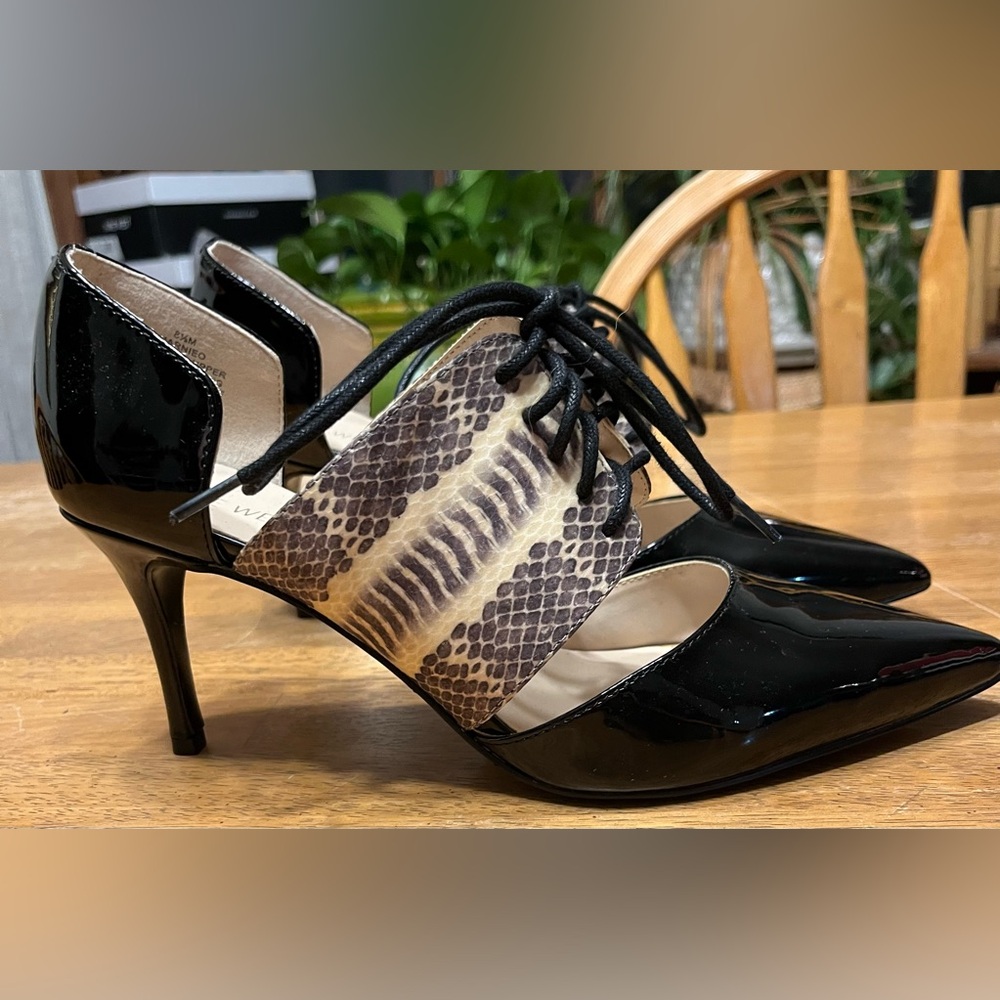 Nine West black heels size 8 1/2. Snake print top with laces. Black patent